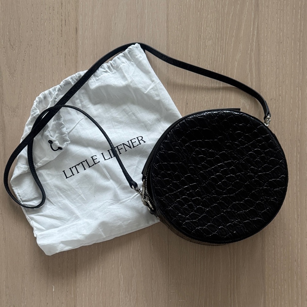 Little Liffner faux croc Round Crossbody Bag with shoulder strap and wrist strap